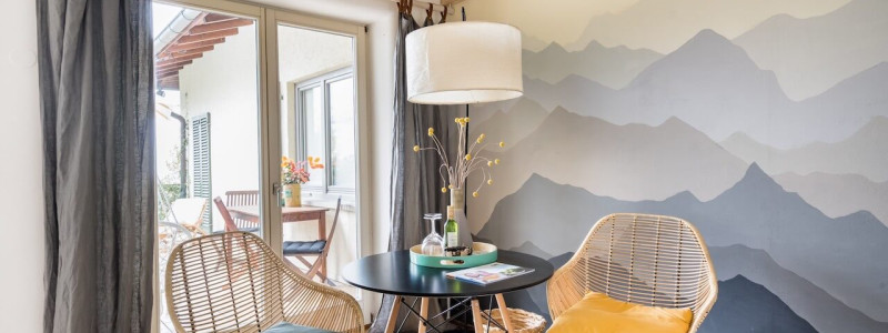 nachhaltige unterkunft cloud 7even ferienwohung ferienapartment ferienloft dreilaendereck suedbaden baden markgraefler land urlaub auf dem land in der natur lehmputz kalkfarben oekostrom essplatz sitzplatz berge