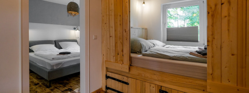 harzverbunden waldquartier holzhaeuser natur harz holz urlaub mit kindern familienurlaub auszeit mit freunden yoga retreat teamevents veranstaltungen tipi zelt kraftort naturverbundenheit schlafkoje schlafzimmer