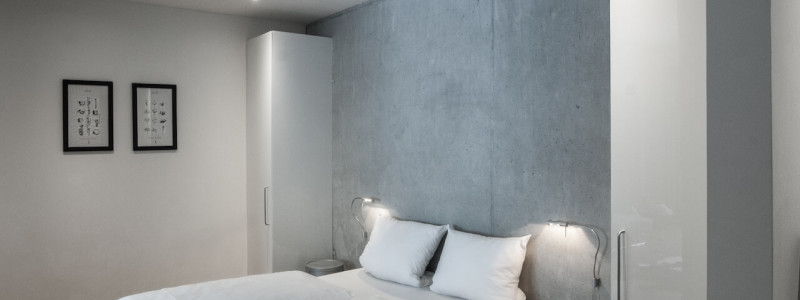 jotvier jungholz ferienwohnung allgäu urlaub in den bergen in der natur mit der familie mit hund nachhaltige bauweise heimische natürliche hölzer baumaterialien schlafzimmer