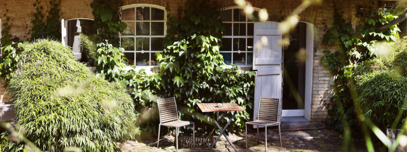 ort der zeit stentenmuehle schleswig holstein ferienwohnungen urlaub am wasser im gruenen in der natur mit hunden zwischen zwei meeren wasserkraftwerk terrasse